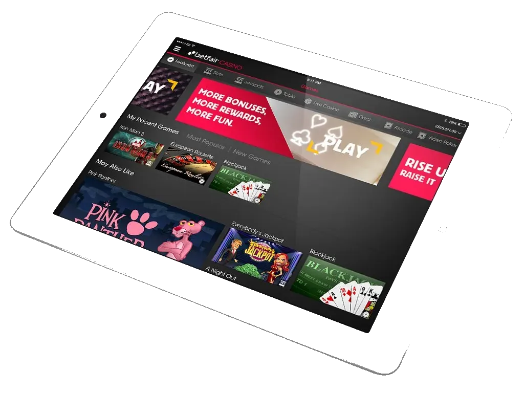 An iPad showing the Betfair casino lobby, with game tiles across the screen.