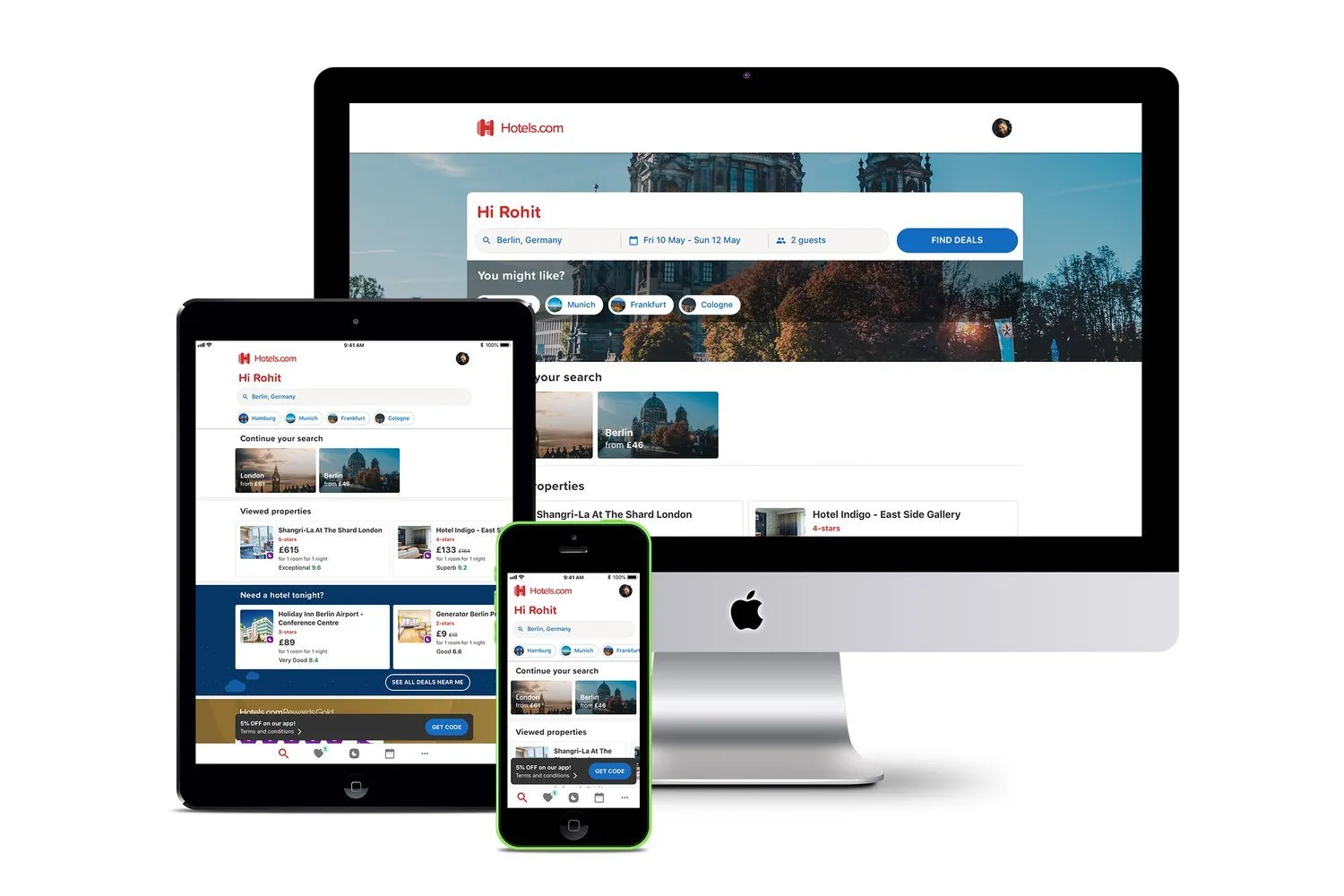 An iMac, an iPad, and an iPhone on a desk, all showing the Hotels.com site and app.